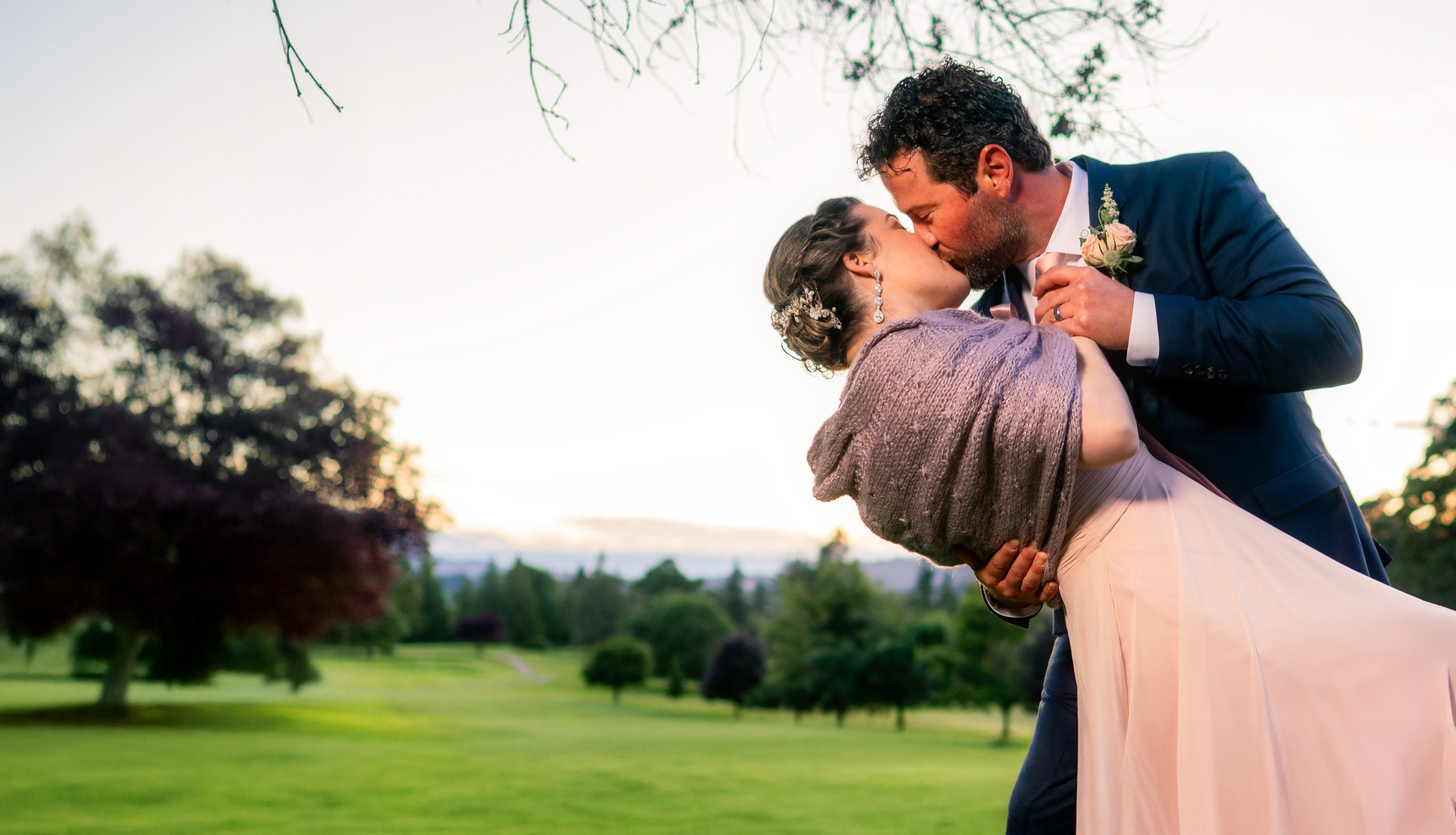 Fred dips Jennifer for a kiss during their Oregon wedding portrait session.