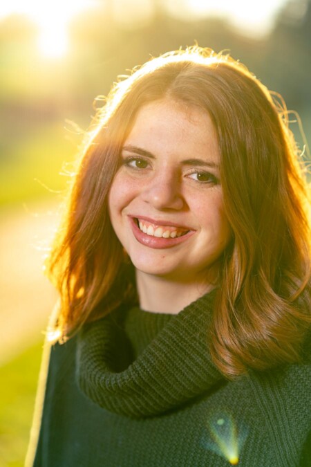 Senior portrait with red hair.