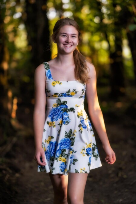 Senior portrait in the woods.